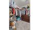 Spacious walk-in closet with built-in shelving and hanging rods for optimal organization at 2009 Parador Aly, Mcdonough, GA 30253