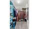 Well-organized walk-in closet with dresser and ample storage space for clothing at 2009 Parador Aly, Mcdonough, GA 30253