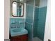 Quaint bathroom with a vintage sink, medicine cabinet, and a glass door shower at 3025 Ebenezer Rd., Se Rd, Conyers, GA 30094