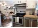 Kitchen featuring stainless appliances, white cabinetry and butcher block countertops at 3025 Ebenezer Rd., Se Rd, Conyers, GA 30094