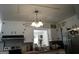 View of upper kitchen cabinets with window to eat-in kitchen area at 3025 Ebenezer Rd., Se Rd, Conyers, GA 30094