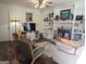 Living room with built-in shelves, stylish furniture, and a ceiling fan at 3025 Ebenezer Rd., Se Rd, Conyers, GA 30094