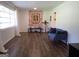 Bright living room with hardwood floors, white walls, a large window, and comfortable seating at 3025 Ebenezer Rd., Se Rd, Conyers, GA 30094
