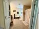 Bright bathroom featuring a soaking tub with shower and a separate vanity area at 3205 Anneewakee Falls Pkwy, Douglasville, GA 30135