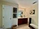 Well-lit bathroom featuring a double sink vanity with framed mirrors and neutral tile floors at 3205 Anneewakee Falls Pkwy, Douglasville, GA 30135
