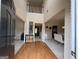A bright foyer welcomes you with gleaming hardwood floors and soaring ceilings at 3205 Anneewakee Falls Pkwy, Douglasville, GA 30135