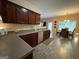 Open kitchen featuring a breakfast nook, stainless steel appliances, and dark cabinetry at 3205 Anneewakee Falls Pkwy, Douglasville, GA 30135