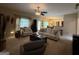 Bright, inviting living room with plush seating and adjacent dining area at 3205 Anneewakee Falls Pkwy, Douglasville, GA 30135