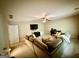 Spacious living room with sectional seating, tv, and an adjacent office area at 3205 Anneewakee Falls Pkwy, Douglasville, GA 30135