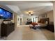 Large main bedroom with tray ceiling, fan, and plush carpeting providing a comfortable living space at 3205 Anneewakee Falls Pkwy, Douglasville, GA 30135