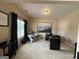 Cozy carpeted office with a large window, neutral walls, modern desk, and a zebra-striped throw at 3205 Anneewakee Falls Pkwy, Douglasville, GA 30135