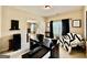 This office features modern black furniture, neutral walls, and carpet, complete with a zebra throw chair at 3205 Anneewakee Falls Pkwy, Douglasville, GA 30135