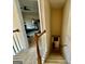 Staircase leading from the second story to the level below at 3205 Anneewakee Falls Pkwy, Douglasville, GA 30135