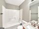 Well-maintained bathroom with a tub and shower combination, complemented by granite countertop vanity at 106 Oakwood Cir, Stockbridge, GA 30281