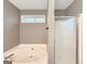 Bright bathroom with a shower and jacuzzi tub, ideal for relaxation and convenience at 106 Oakwood Cir, Stockbridge, GA 30281