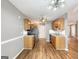 Well-lit kitchen with stainless steel appliances, wooden cabinets, and modern countertops at 106 Oakwood Cir, Stockbridge, GA 30281