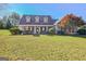 Charming one-story home with a well-manicured lawn and mature landscaping at 100 Clydesdale Ct, Tyrone, GA 30290