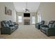 Spacious living room featuring a fireplace and vaulted ceiling at 100 Clydesdale Ct, Tyrone, GA 30290