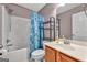 Bathroom with shower-tub combination, vanity, and tile floors at 3338 Gardenside Walk, Loganville, GA 30052