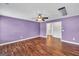 This large bedroom offers wood floors, ceiling fan, and neutral colors at 3338 Gardenside Walk, Loganville, GA 30052