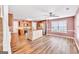 Eat-in kitchen features an island, stainless steel appliances, and hardwood floors at 3338 Gardenside Walk, Loganville, GA 30052