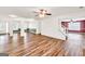 Open living space with hardwood floors, neutral walls, and lots of natural light at 3338 Gardenside Walk, Loganville, GA 30052