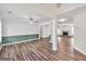 Bright living room featuring hardwood floors, modern trim, and an open layout for comfortable living at 3338 Gardenside Walk, Loganville, GA 30052