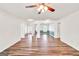 Bright living room with hardwood floors, open floor plan, and neutral color scheme at 3338 Gardenside Walk, Loganville, GA 30052