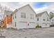 Charming townhomes showcasing a combination of red brick and white wood siding, plus convenient garage parking at 498 N Jeff Davis Dr, Fayetteville, GA 30214