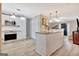 Bright, eat-in kitchen with white cabinetry, stainless steel appliances, and island at 498 N Jeff Davis Dr, Fayetteville, GA 30214