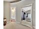 Bright main bedroom with vaulted ceiling reflected in large mirror near ensuite bath at 498 N Jeff Davis Dr, Fayetteville, GA 30214