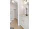 Clean bathroom featuring a marble countertop and white cabinets at 6857 Louis Dr, Locust Grove, GA 30248
