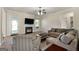 Inviting living room with a cozy fireplace, comfortable seating, and ample space for relaxation at 6857 Louis Dr, Locust Grove, GA 30248