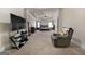 Large main bedroom with lounge area and tray ceilings at 6857 Louis Dr, Locust Grove, GA 30248