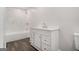 Bathroom featuring tiled shower/tub combo, white vanity, and modern fixtures at 125 Lafayette Dr, Fayetteville, GA 30214