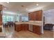 Bright kitchen and dining area with stainless steel appliances and an open concept design at 319 Beaconsfield Dr, Sharpsburg, GA 30277