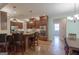 Kitchen with stainless steel appliances, wood cabinets and breakfast bar at 319 Beaconsfield Dr, Sharpsburg, GA 30277
