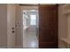 Large laundry room with shelving, storage and modern washer and dryer at 319 Beaconsfield Dr, Sharpsburg, GA 30277