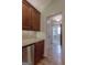 Convenient mudroom area features a wet bar and beverage center with access to laundry at 319 Beaconsfield Dr, Sharpsburg, GA 30277