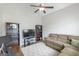 Home office features ample desk space and comfortable seating area at 319 Beaconsfield Dr, Sharpsburg, GA 30277