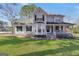 Charming two-story home with a landscaped front yard and inviting front porch at 701 Monticello Ln, Mcdonough, GA 30253