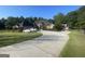 Attractive single-story brick home with an attached garage, long driveway, and well-manicured front yard at 624 Kristen Ct, Mcdonough, GA 30252
