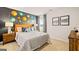 This bedroom features colorful planets on the wall at 147 Oakchase Park Ln, Hampton, GA 30228