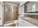 Updated bathroom featuring shower, tile and granite countertops at 203 First Leaf, Peachtree City, GA 30269