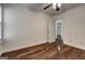 Bedroom with hardwood floors, crown molding, and neutral walls creating a relaxing and inviting space at 203 First Leaf, Peachtree City, GA 30269