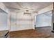 Dining room features updated light fixture and hardwood floors at 203 First Leaf, Peachtree City, GA 30269