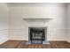 Classic fireplace featuring detailed trim and a tiled hearth at 203 First Leaf, Peachtree City, GA 30269