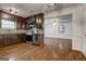 The kitchen features stainless steel appliances, granite countertops, and dark wood cabinets at 203 First Leaf, Peachtree City, GA 30269