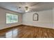 Spacious living room featuring hardwood floors and lots of natural light at 203 First Leaf, Peachtree City, GA 30269