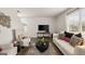 Cozy living room with comfortable seating, modern decor, and plenty of natural light at 636 Whitman Ln # 2035, Stockbridge, GA 30281